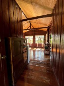 an inside view of a house with a wooden floor at Elephant House and Pool Villas in Ban Sop Ao