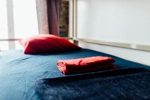 Cama ou camas em um quarto em Alt Hostel