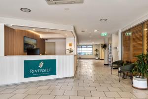 a lobby of a hotel with a reception desk at Riverside Apartments & Hotel in Ballina +83 photos