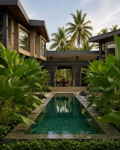 an image of a house with a swimming pool at Islaya Siargao on Opening Phase in General Luna