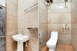 a bathroom with a toilet and a sink and a shower at Super Hotel O by OYO ISBT Mohali Formerly Holiday Spot in Mohali +22 photos