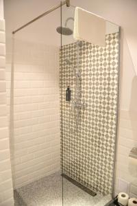a shower in a bathroom with a glass shower stall at Sándor János Villa in Sovata +47 photos