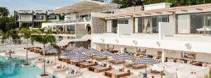 an aerial view of a hotel with chairs and a pool at The heights luxury sea view 2BR near Kata Beach in Kata Beach