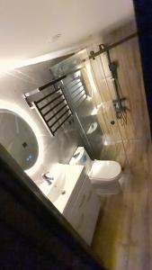 an overhead view of a bathroom with a sink and a toilet at Glamping Yeghegis in Yeghegis