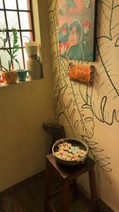 a bowl of food on a table in a room at Summer Beach House in Alleppey