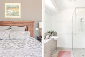 a bedroom with a bed and a shower and a sink at Aria House in Trentham
