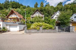 a row of houses in a subdivision with trees at Fewo Abendruh in Elzach