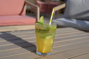 a drink sitting on top of a table at Camping Domaine du Morbihan in Ambon