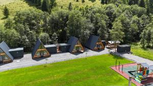 an overhead view of a group of tents in a park at Complex turistic Casa Diaconu in Breaza