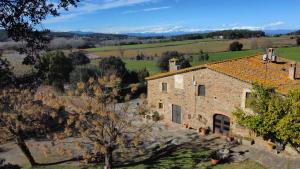 an aerial view of a stone house in the countryside at Mas Duran in La Pera