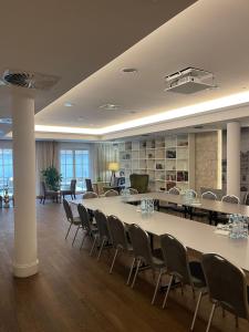 a large meeting room with a large table and chairs at Berberys Park Hotel in Kazimierz Dolny +56 photos
