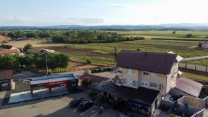 an aerial view of a small town with a building at Motel Atos in Laktaši