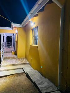 an empty hallway of a house at night at R&N Hosts Mokhotlong in Mokoeng