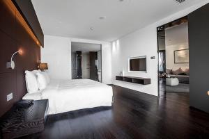 Postel nebo postele na pokoji v ubytování Shenzhen O Hotel