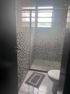 a bathroom with a shower with a toilet at Hotel Real Centro in São Paulo +16 photos