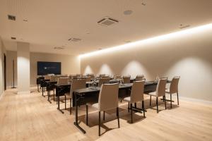 a conference room with a long table and chairs at Eurostars Villa Itziar in San Sebastián +58 photos
