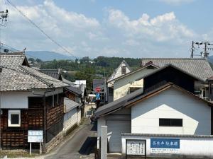 a village with houses and a street with a building at Haraya in Nakatsugawa