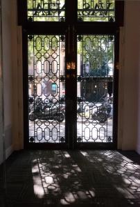 an open door with stained glass windows in a room at Hotel Vasanta in Barcelona +40 photos