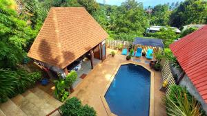 an overhead view of a house with a swimming pool at Villa Ayutthaya, Private Pool Near Kantiang Beach in Ko Lanta