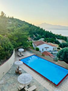 an aerial view of a swimming pool in a villa at Samos Panorama Hills in Pythagoreio