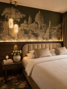 En eller flere senge i et værelse på GW Danube Hotel