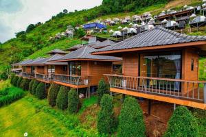 a house on the side of a hill at Mon P Monjam in Mon Jam +46 photos