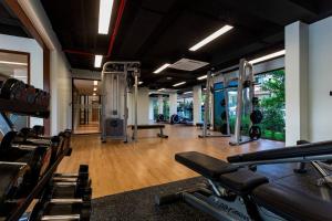 a gym with a bunch of equipment in a room at Wing 4206 - Modern Resort Studio Koh Samui in Bophut