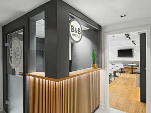 an office with a bba works sign on a wall at B&B HOTEL Flensburg-City in Flensburg