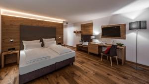 Posteľ alebo postele v izbe v ubytovaní Eden Boutique Hotel
