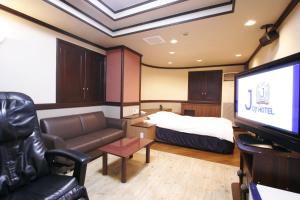 A seating area at Hotel Joy (Adult Only)