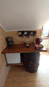 a room with a table with cups on a wall at LA ROCCA BIANCA in Demonte