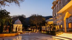 a view of a building with a gazebo at night at KK Royal Hotel & Convention Centre in Jaipur