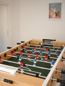 a group of figurines in a gymnasium at Galaxy Mood - 10 min Disney in Couilly-Pont-aux-Dames