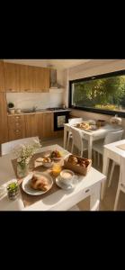 a kitchen with a table with food on it at Altea in Taurianova
