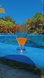 a wine glass sitting on top of a table at Triple A visitors in Kilindoni
