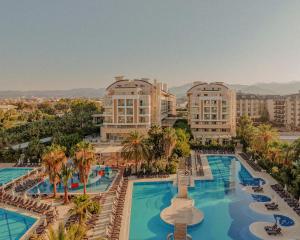 an aerial view of a resort with a swimming pool at Hedef Resort Hotel in Konaklı