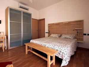 Tempat tidur dalam kamar di Casa Vacanze Shivon