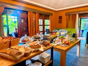 a table with a bunch of food on it at Al Dazk in Ribeira Brava