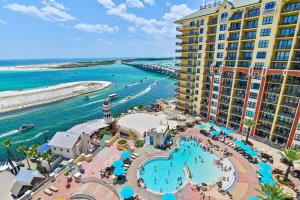 an aerial view of a resort with a pool and the ocean at Breathtaking Views Emerald Grande 3BR,2BA 904E in Destin