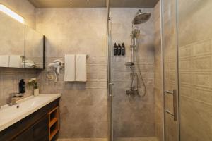 a bathroom with a shower and a sink at Kiraz Vela Selimiye in Marmaris +24 photos