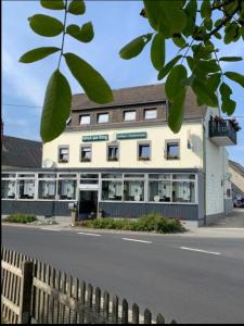 a building on the side of a street at Vina am Ring in Mannebach