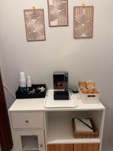 a white desk with a laptop on top of it at Domus Relax in Battipaglia