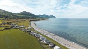 an aerial view of a beach and the ocean at Beach Bungalow in Nefyn