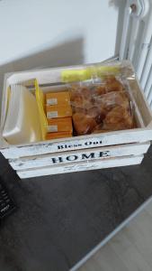a box of food sitting on top of a table at Da Mario in Auronzo di Cadore