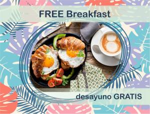 a breakfast plate with eggs and vegetables and a cup of coffee at Los Corales CASAS DE LAS TERRAZAS Bavaro POOL VIEW HOTEL Bavaro Beach CLUB & SPA in Punta Cana