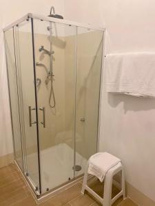 a shower with a glass enclosure in a bathroom at Hotel Imperiale in Fiuggi +50 photos