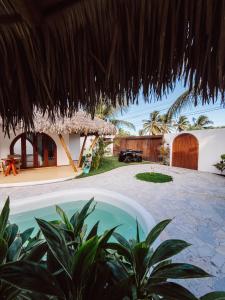 a view of a house with a swimming pool at Villa Mia - Praia do Preá in Prea