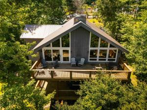an aerial view of a house with a porch at Majestic Mountain Haus in Beech Mountain