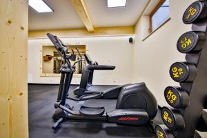 a gym with a exercise bike in a room at „Malućko Chata” in Zakopane