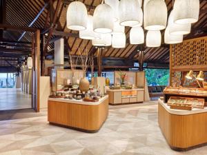 a lobby with a store with many items on display at Novotel Bali Benoa in Nusa Dua